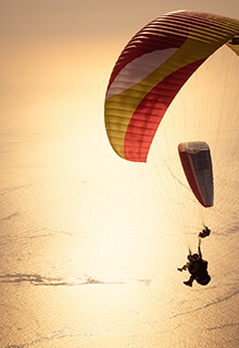 Paragliders in The Sky